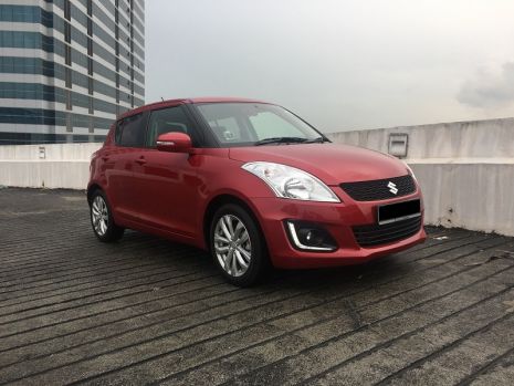 https://www.mycarforum.com/uploads/sgcarstore/data/11/111580277446_0Suzuki Swift 1.4 Rental & Leasing (Front View).JPG